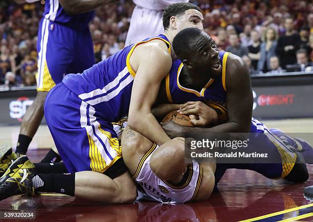 Richard Jefferson of the Cleveland Cavaliers battles for the ball with Klay Thompson of the Golden State Warriors and Draymond Green during the...