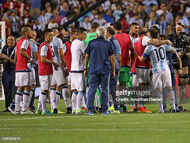 The team from Argentina celebrates with Lionel Messi after a win against Panama after a match in the 2016 Copa America Centenario at Soldier Field on...