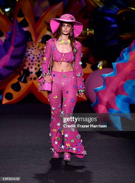 Model walks the runway at the Moschino Spring/Summer 17 Menswear and Women's Resort Collection during MADE LA at L.A. LIVE Event Deck on June 10,...