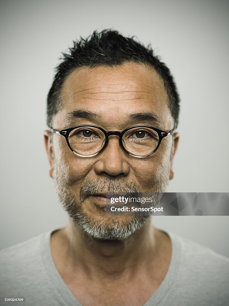 Portrait of a japanese man wearing glasses