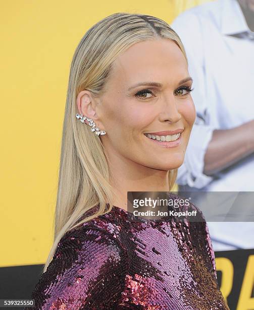 Actress Molly Sims arrives at the Los Angeles Premiere "Central Intelligence" at Westwood Village Theatre on June 10, 2016 in Westwood, California.