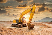 excavator loader machine during earthmoving works outdoors
