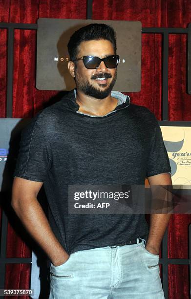 Indian Bollywood actor R.Madhavan poses as he attends the Viacom 18 Motion Pictures 5years completion party in Mumbai late June 10, 2016. / AFP