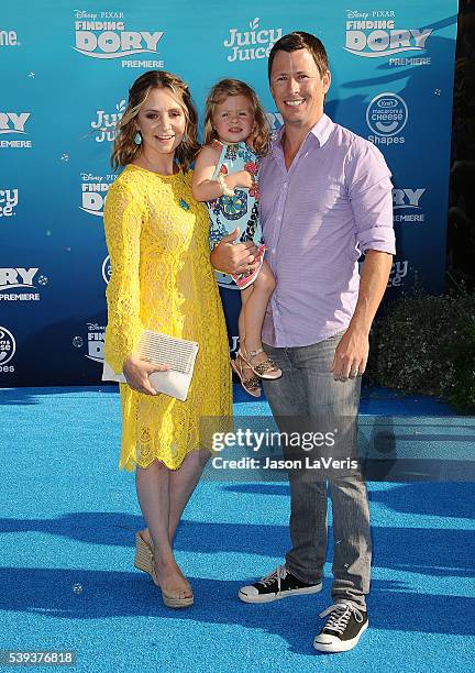 Actress Beverley Mitchell, husband Michael Cameron and daughter Kenzie Cameron attend the premiere of "Finding Dory" at the El Capitan Theatre on...