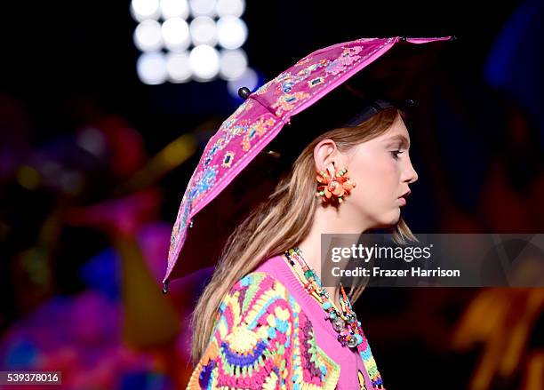 Model walks the runway at the Moschino Spring/Summer 17 Menswear and Women's Resort Collection during MADE LA at L.A. LIVE Event Deck on June 10,...