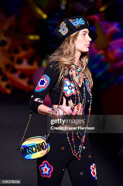 Model walks the runway at the Moschino Spring/Summer 17 Menswear and Women's Resort Collection during MADE LA at L.A. LIVE Event Deck on June 10,...