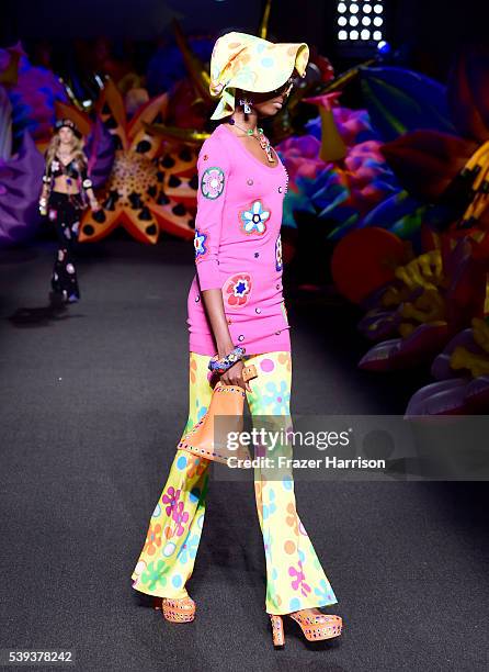 Model walks the runway at the Moschino Spring/Summer 17 Menswear and Women's Resort Collection during MADE LA at L.A. LIVE Event Deck on June 10,...