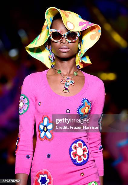 Model walks the runway at the Moschino Spring/Summer 17 Menswear and Women's Resort Collection during MADE LA at L.A. LIVE Event Deck on June 10,...