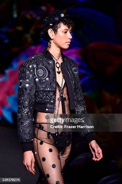 Model walks the runway at the Moschino Spring/Summer 17 Menswear and Women's Resort Collection during MADE LA at L.A. LIVE Event Deck on June 10,...