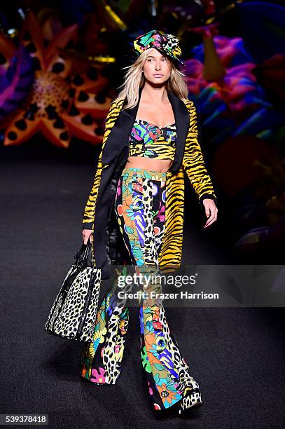 Hailey Baldwin walks the runway at the Moschino Spring/Summer 17 Menswear and Women's Resort Collection during MADE LA at L.A. LIVE Event Deck on...