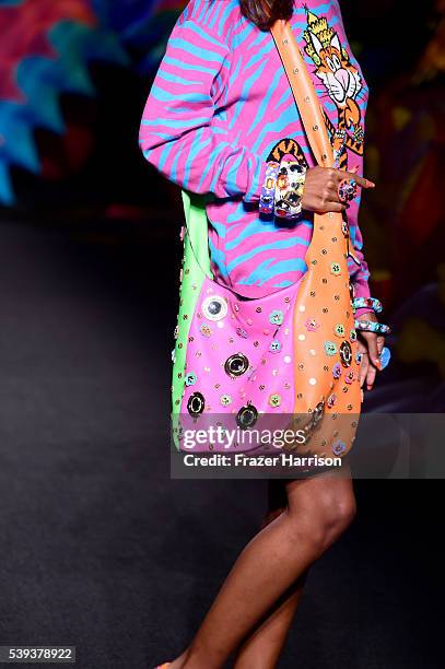 Model, handbag and fashion detail, walks the runway at the Moschino Spring/Summer 17 Menswear and Women's Resort Collection during MADE LA at L.A....