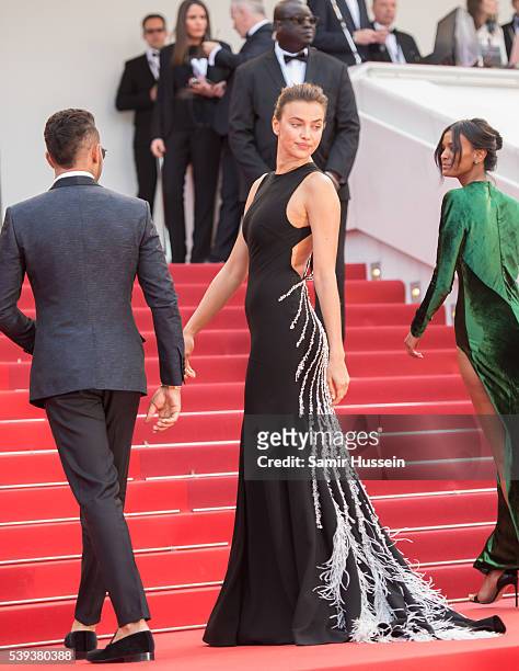 Lewis Hamilton and Irana Shayk attend the screening of "The Unkown Girl " at the annual 69th Cannes Film Festival at Palais des Festivals on May 18,...
