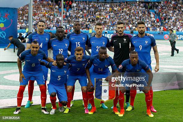 France's players pose for a team photo prior to the Euro 2016 group A football match between France and Romania at Stade de France, in Saint-Denis,...