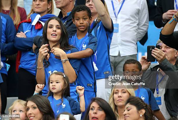 Ludivine Sagna, wife of Bacary Sagna of France and their sons Elias Sagna and Kais Sagna attend the UEFA Euro 2016 Group A opening match between...