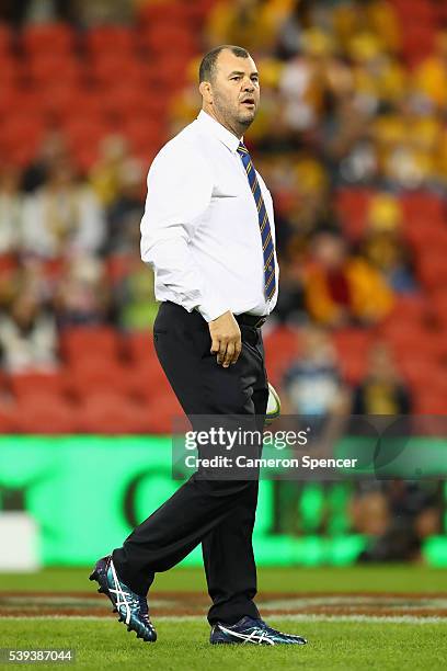 Wallabies coach Michael Cheika watches his team warm up prior to the International Test match between the Australian Wallabies and England at Suncorp...