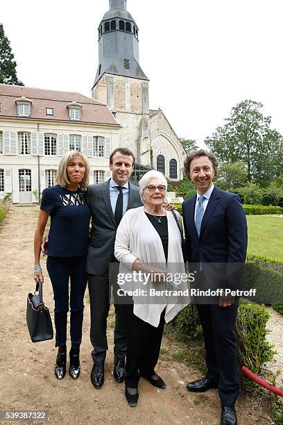 Brigitte Macron, Emmanuel Macron, Line Renaud and Stephane Bern attend the 'College Royal et Militaire de Thiron-Gardais' Exhibition Rooms...