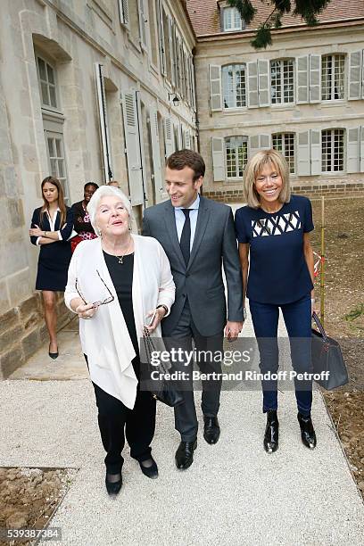 Line Renaud, Emmanuel Macron and Brigitte Macron attend the 'College Royal et Militaire de Thiron-Gardais' Exhibition Rooms Inauguration on June 10,...