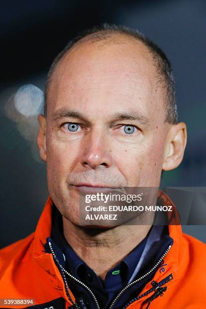Swiss pilot Bertrand Piccard looks on after the successful landing of the Solar Impulse 2 aircraft at JFK International Airport on June 11, 2016 in...