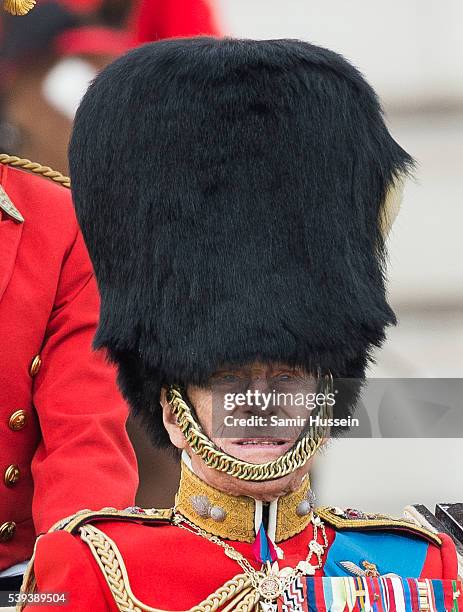 Prince Philip, Duke of Edinburgh rides by carriage during the Trooping the Colour, this year marking the Queen's official 90th birthday at The Mall...