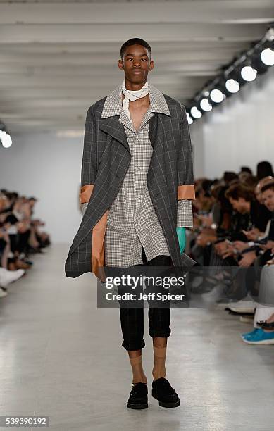 Model walks the runway at the Agi & Sam show during The London Collections Men SS17 at BFC Show Space on June 11, 2016 in London, England.