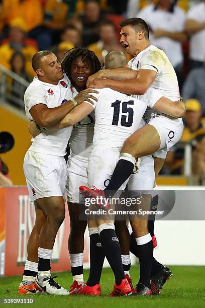 Marland Yarde of England celebrates scoring a try with team mates during the International Test match between the Australian Wallabies and England at...