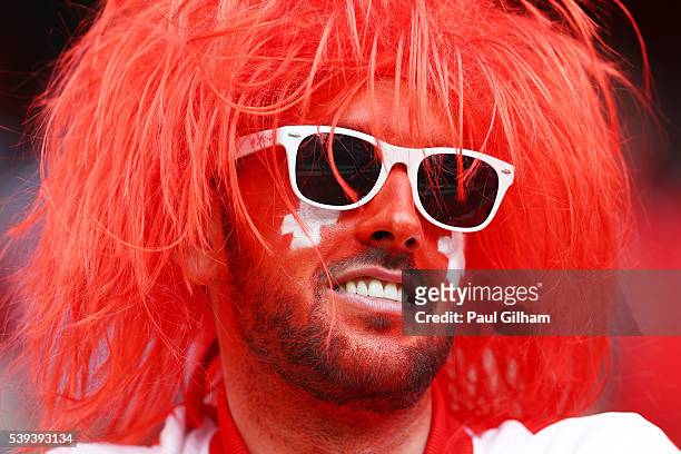 Switzerland supporter enjoys the atmosphere prior to the UEFA EURO 2016 Group A match between Albania and Switzerland at Stade Bollaert-Delelis on...