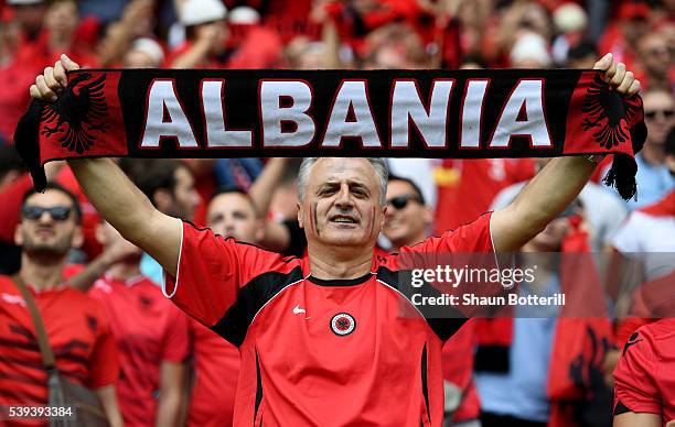 An Albania supporter enjoys the atmosphere prior to the UEFA EURO 2016 Group A match between Albania and Switzerland at Stade Bollaert-Delelis on...