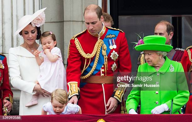 Catherine, Duchess of Cambridge, Princess Charlotte, Prince George, Prince William, Duke of Cambridge, Queen Elizabeth II stand on the balcony during...