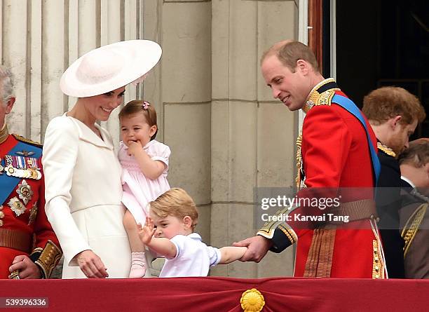 Catherine, Duchess of Cambridge, Princess Charlotte and Prince George, Prince William, Duke of Cambridge attend the Trooping the Colour, this year...