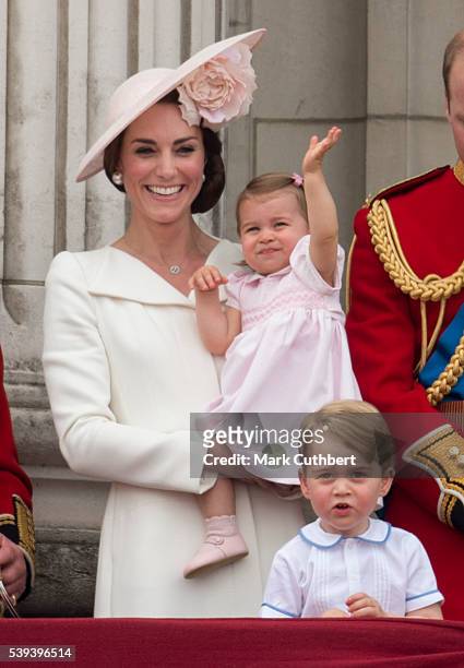 Catherine, Duchess of Cambridge with Princess Charlotte of Cambridge and Prince George of Cambridge during the Trooping the Colour, this year marking...
