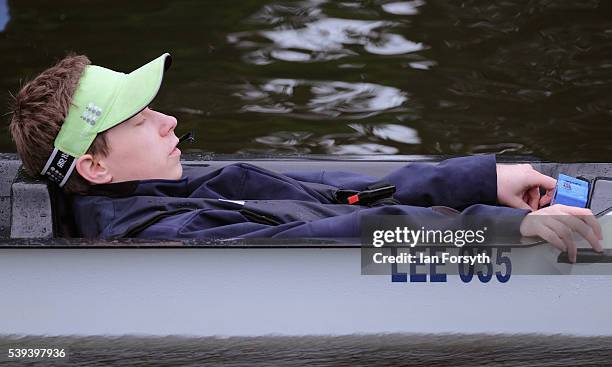 Rower rests as he and other rowers from across the country prepare to take part in the 183rd annual regatta on the River Wear on June 11, 2016 in...