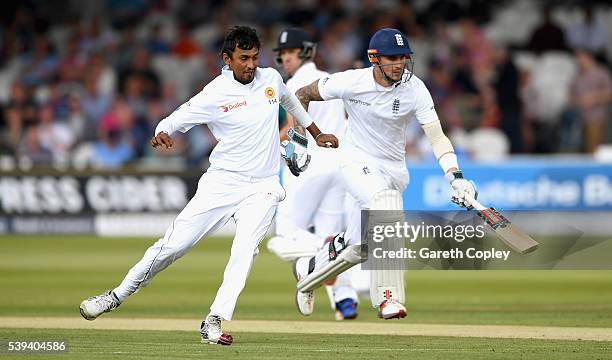 Suranga Lakmal of Sri Lanka kicks at the ball as Alex Hales of England makes a run during day three of the 3rd Investec Test match between England...