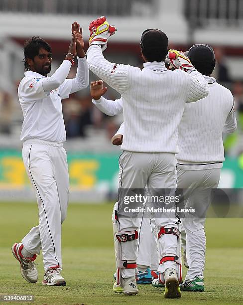 Nuwan Pradeep of England celebrates bowling Joe Root of England during day three of the 3rd Investec Test match between England and Sri Lanka at...