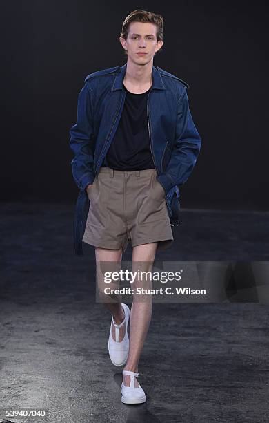 Models walk the runway at the E. Tautz show during The London Collections Men SS17 at BFC Presentation Space on June 11, 2016 in London, England.