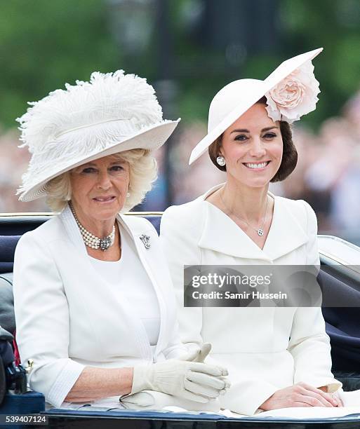 Camilla, Duchess of Cornwall and Catherine, Duchess of Cambridge ride by carriage during the Trooping the Colour, this year marking the Queen's...