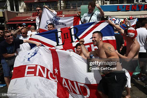 England fans gather and cheer with their flags ahead of the game against Russia later today on June 11, 2016 in Marseille, France. Football fans from...