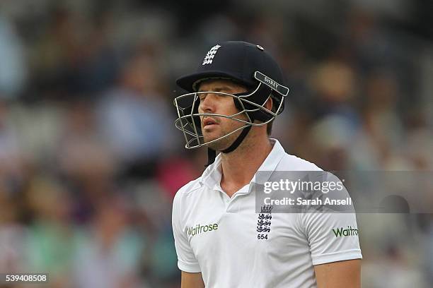 England's Nick Compton casts a dejected figure as he leaves the pitch after being dismissed for 19 runs during day three of the 3rd Investec Test...