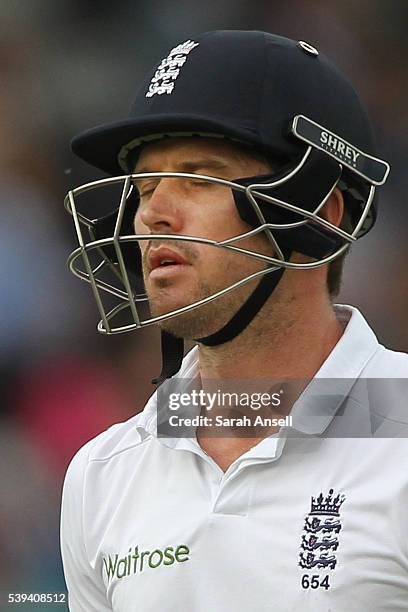 England's Nick Compton casts a dejected figure as he leaves the pitch after being dismissed for 19 runs during day three of the 3rd Investec Test...