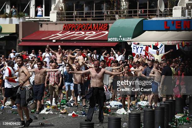 Rubbish lines the streets as England fans gather, cheer and clash with police ahead of the game against Russia later today on June 11, 2016 in...