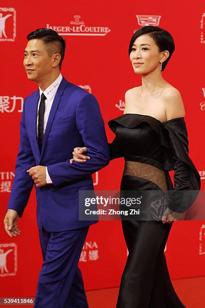 Nick Cheung Ka Fai and Charmaine Sheh arrive for the red carpet of the 19th Shanghai International Film Festival at Shanghai Grand Theatre on June...