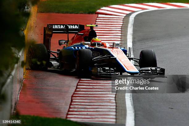 Rio Haryanto of Indonesia driving the Manor Racing MRT-Mercedes MRT05 Mercedes PU106C Hybrid turbo crashes into the wall during qualifying for the...