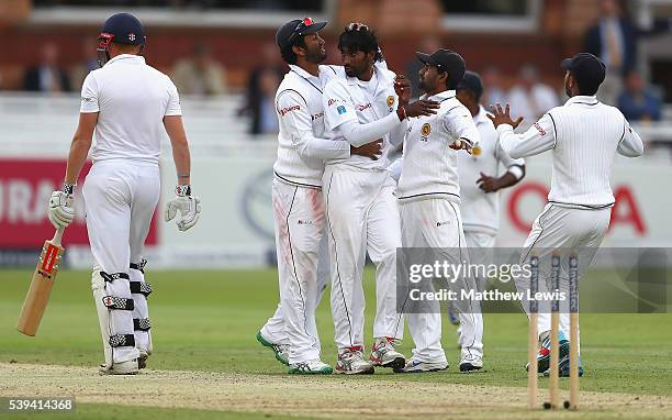 Nuwan Pradeep of Sri Lanka is congratulated on bowling Jonny Bairstow of England during day three of the 3rd Investec Test match between England and...