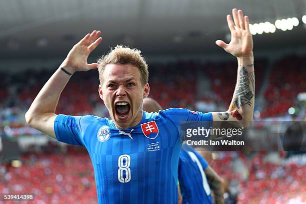 Ondrej Duda of Slovakia celebrates scoring his team's first goal during the UEFA EURO 2016 Group B match between Wales and Slovakia at Stade Matmut...
