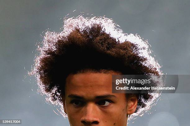 Leroy Sane of Germany looks on during a Germany training session at Stade Pierre-Mauray ahead of their opening UEFA EURO 2016 match against Ukraine,...