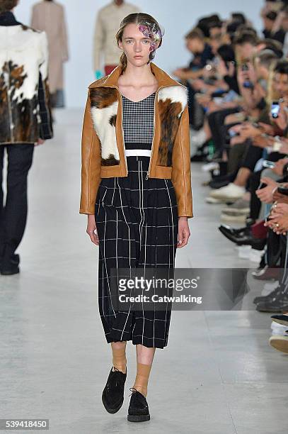 Model walks the runway at the Agi & Sam Spring Summer 2017 fashion show during London Menswear Fashion Week on June 11, 2016 in London, United...