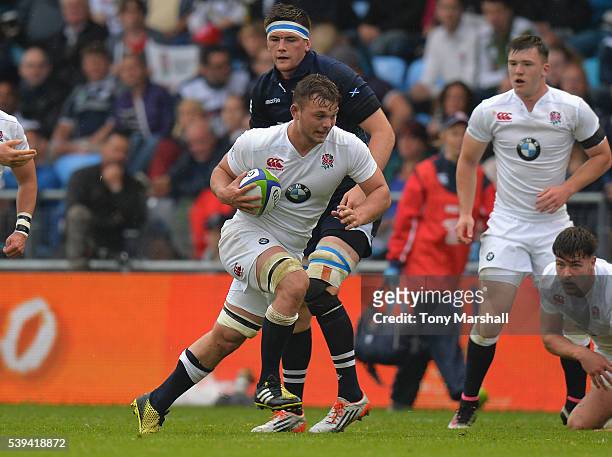 Will Evans of England makes a break during the World Rugby U20 Championship match between England and Scotland at The Academy Stadium on June 11,...