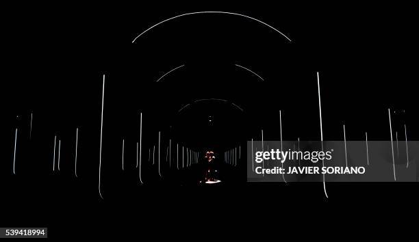 Couple takes a "Selfie" inside an art installation entitled "Selfi" by the Spanish-Mexican artist Darya von Berner, on June 11, 2016 at the Matadero,...