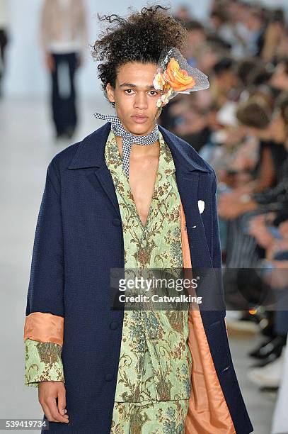 Model walks the runway at the Agi & Sam Spring Summer 2017 fashion show during London Menswear Fashion Week on June 11, 2016 in London, United...