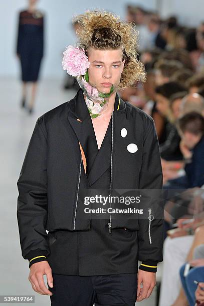 Model walks the runway at the Agi & Sam Spring Summer 2017 fashion show during London Menswear Fashion Week on June 11, 2016 in London, United...