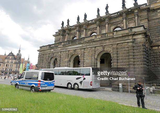 Participants in the 2016 Bilderberg arrive at the Dresden Opera House or 'Semperoper' during a group tour on Saturday afternoon, June 11, 2016 in...